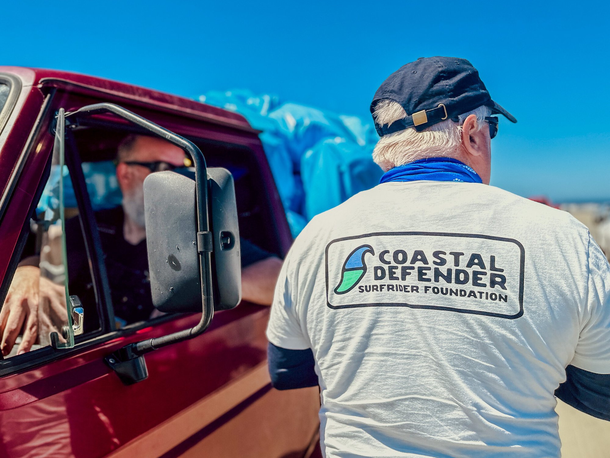 Volunteer Wearing Surfriger Gear