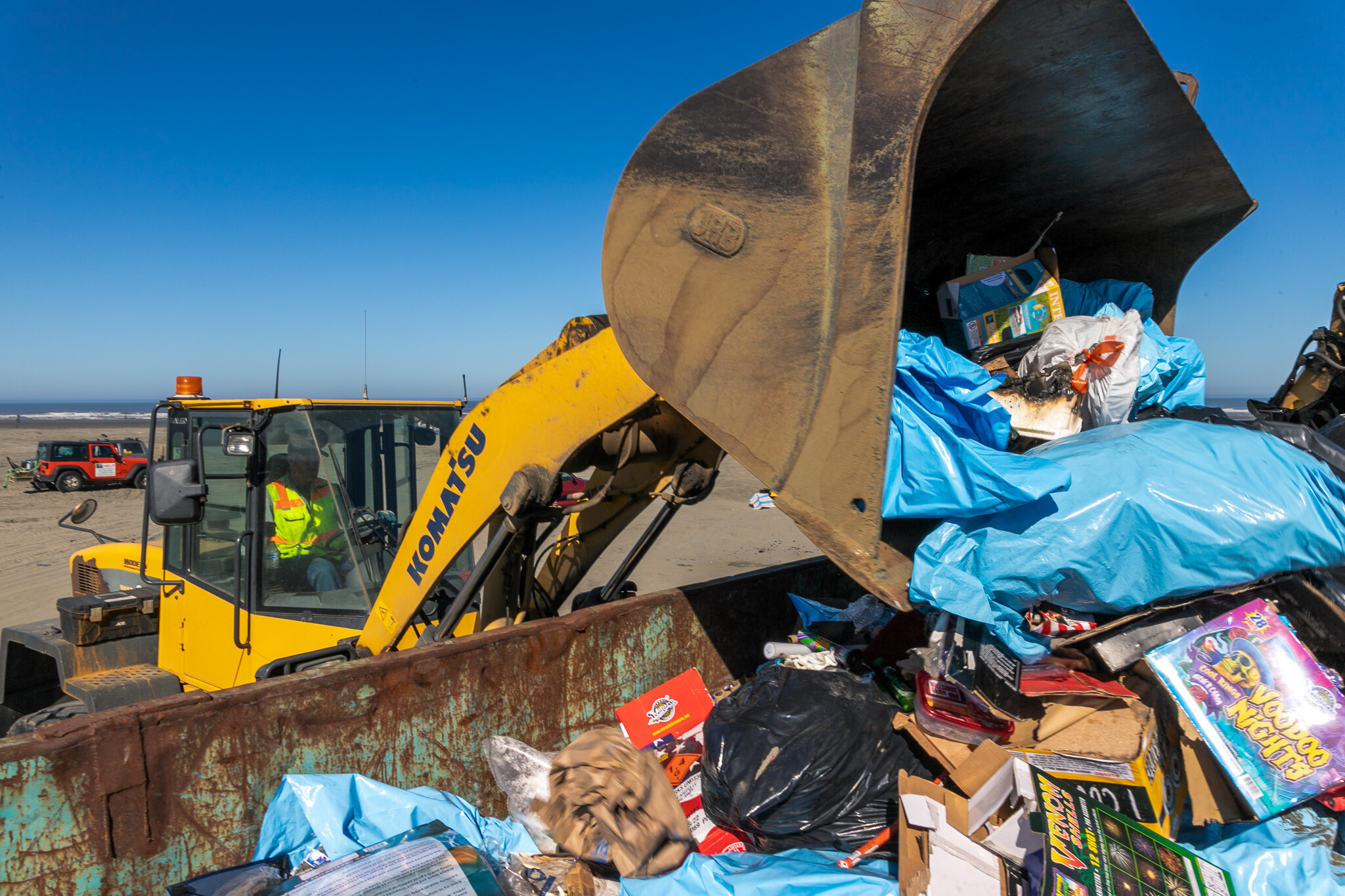 In the dumpster, bulldozer drop-1